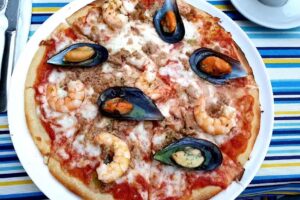 Mucho Más Que Pizza