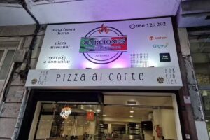 Pizzería +Porciones